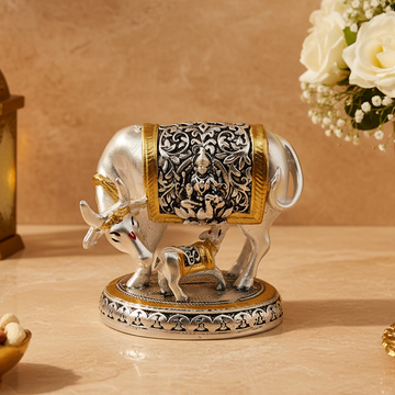 Silver and Gold Glossy Kamdhenu Cow with Calf Figurine | Divine Cow Idol for Home Temple | Lucky Vastu Showpiece | 3 Inch Collectible